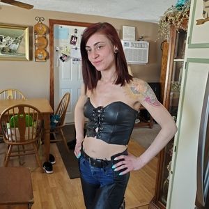 Women's leather chaps and  Leather top.